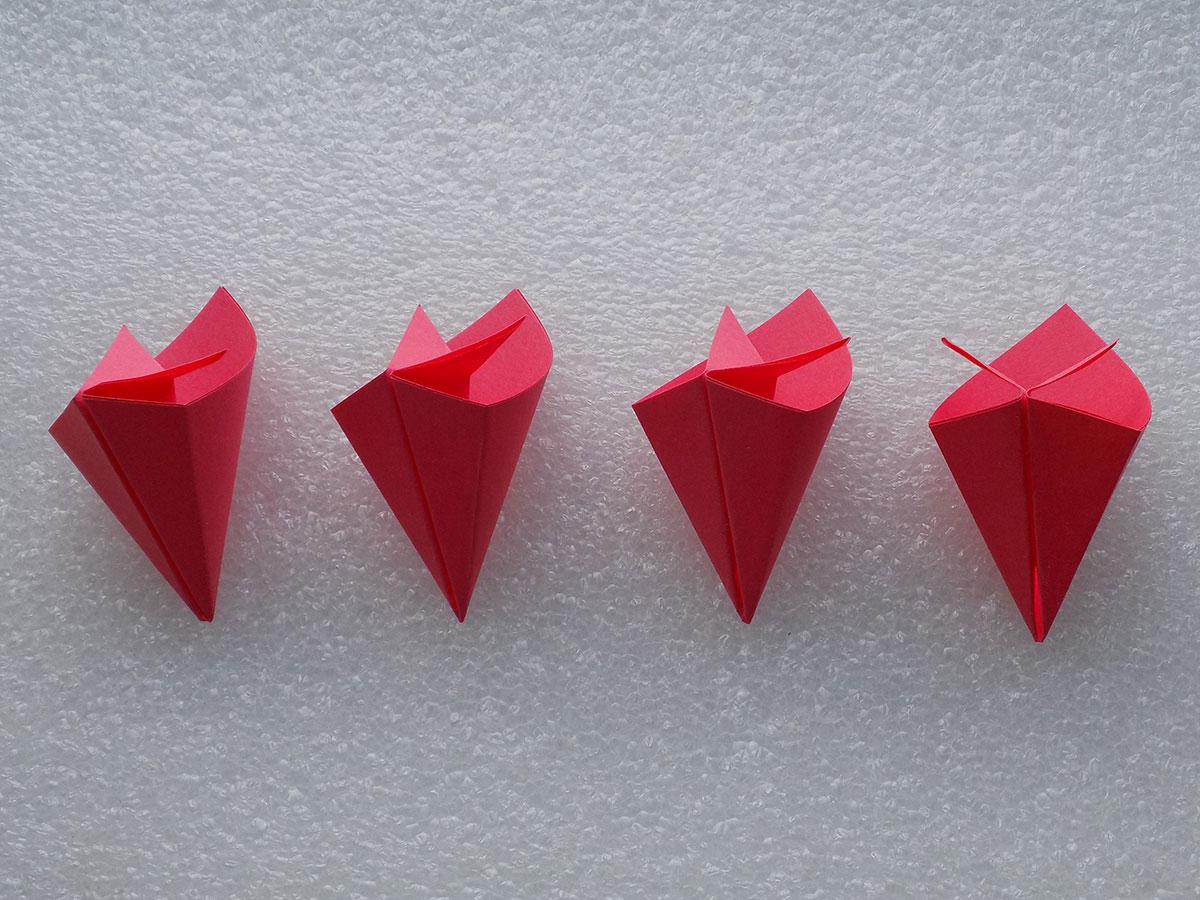 Крокус оригами для детей. Оригами цветок. Оригами лепесток. Крокусы оригами. Цветы оригами для украшения стола.