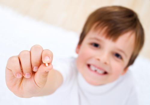 Смена молочных зубов у ребенка